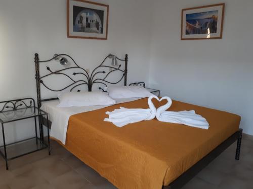 Cama o camas de una habitación en Mariliza Beach Hotel