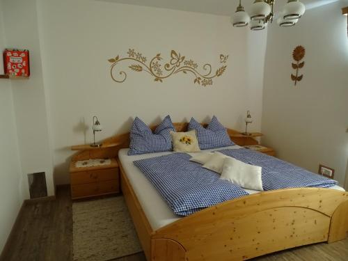 מיטה או מיטות בחדר ב-Gästehaus zur alten Buche