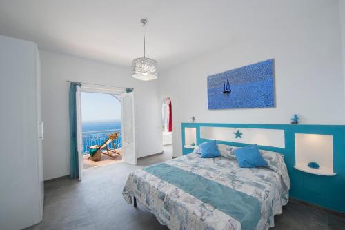 En eller flere senge i et værelse på Casa Mimi