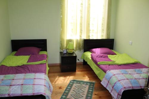 Postel nebo postele na pokoji v ubytování La Deka GuestHouse