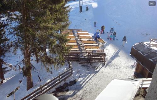 a group of people on a ski slope in the snow at Apartments Susanne und Jasmin - Haus Sonnleitn in Sonnenalpe Nassfeld