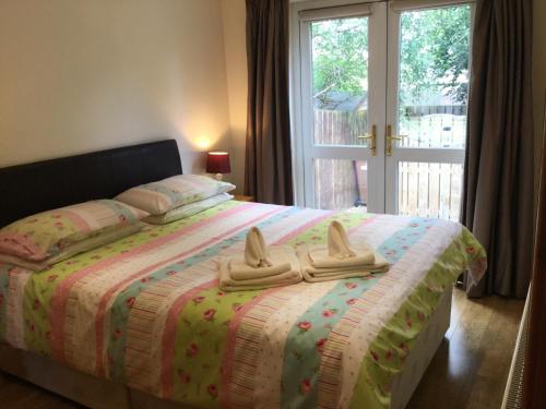 Postelja oz. postelje v sobi nastanitve Four-Bedroom House - Stratherrick Free Parking