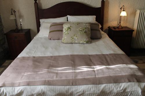 Llit o llits en una habitació de Guesthouse Karahalios