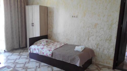 Postel nebo postele na pokoji v ubytování Guest House Vitali