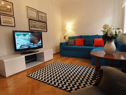 Телевизор и/или развлекательный центр в Grand-Tourist Anker Gate Apartments