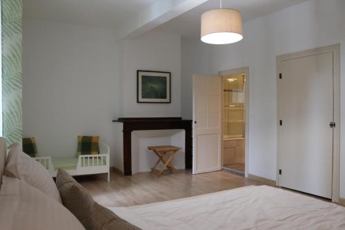 Postel nebo postele na pokoji v ubytování Gîte tout Confort au Coeur du Village Verniolle