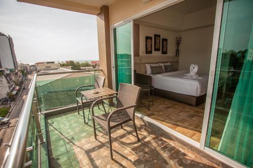Кровать или кровати в номере City View Residence