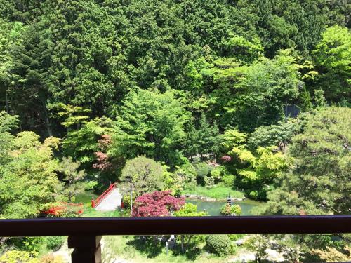 a view of a garden from a window at Sekishoin in Koyasan