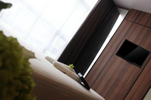 Televisyen dan/atau pusat hiburan di Imperial Regency Suites & Kuala Lumpur