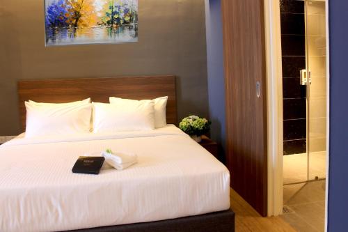Katil atau katil-katil dalam bilik di Imperial Regency Suites & Kuala Lumpur