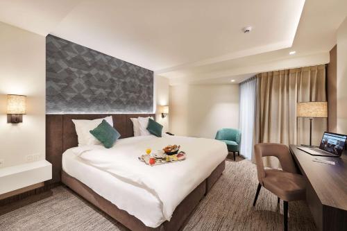 Keizershof Hotel Aalstにあるベッド