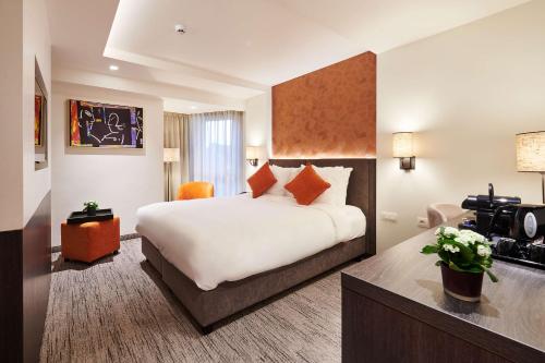 Keizershof Hotel Aalstにあるベッド
