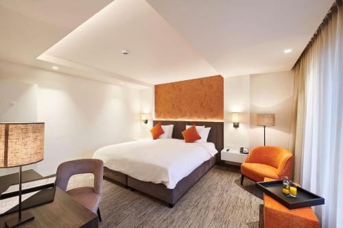 Keizershof Hotel Aalstにあるベッド