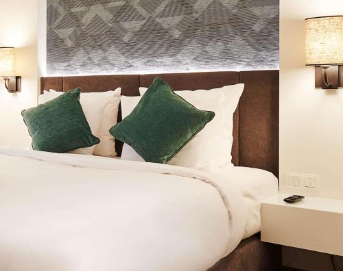 Keizershof Hotel Aalstにあるベッド