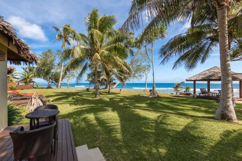 a view of the beach from the backyard of a resort at Eratap Beach Resort in Port Vila