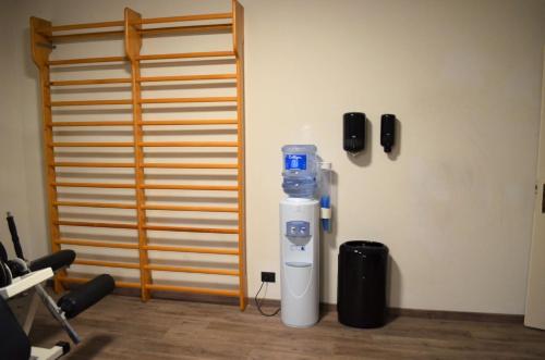 a white and blue blender sitting on the floor in a room at Best Western Park Hotel in Piacenza