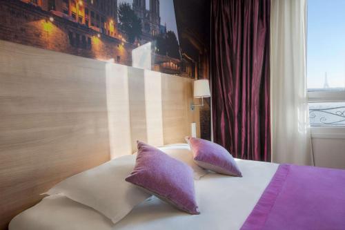 Una cama o camas en una habitación de Best Western Rives de Paris La Defense