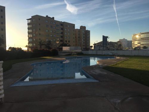 Piscina a Departamento Edificio Playa Blanca o a prop