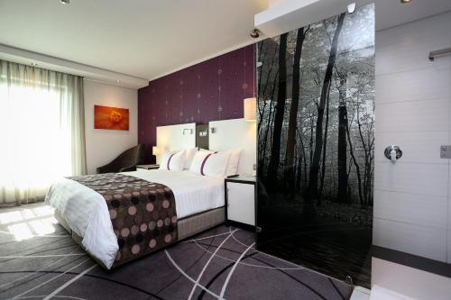 Letto o letti in una camera di Hotel Verde Cape Town Airport