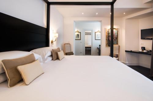 Hotel Michelangelo & Day SPAにあるベッド
