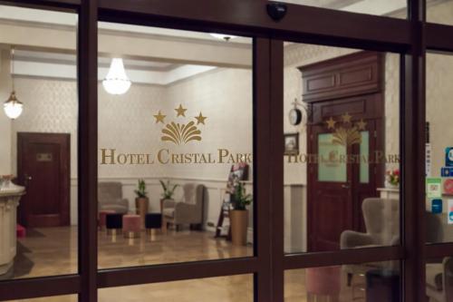 a glass door of a hotel casillian park at Hotel Cristal Park in Dąbrowa Tarnowska