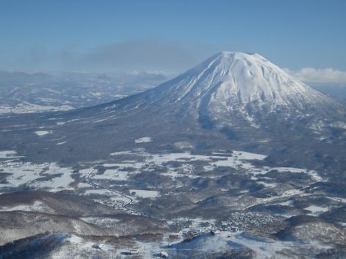 an aerial view of a snow covered mountain at Boken Kazoku in Kutchan