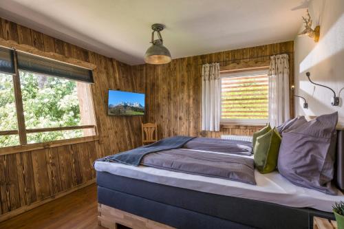 Postel nebo postele na pokoji v ubytování Narzenhof Wellness Chalets, Familien & Luxus Apartments am Bauernhof
