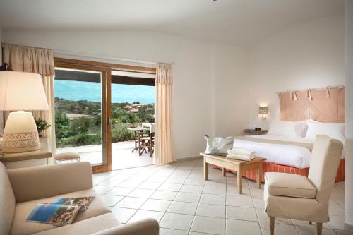 Postel nebo postele na pokoji v ubytování Hotel Marinedda Thalasso & Spa