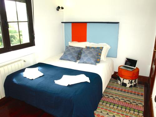 Katil atau katil-katil dalam bilik di Casa Boo de Piélagos - Playa de Liencres