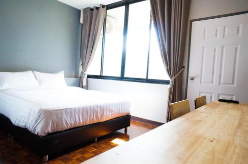 Ένα ή περισσότερα κρεβάτια σε δωμάτιο στο Lux Rooms Night Bazaar