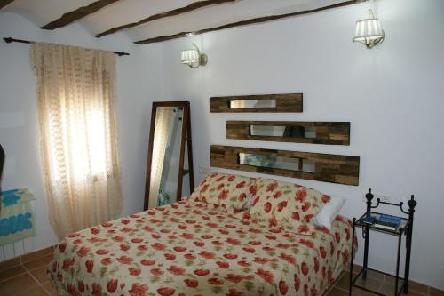Säng eller sängar i ett rum på Casa rural El Majuelo