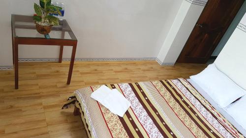 Postel nebo postele na pokoji v ubytování Phat Dat Hotel
