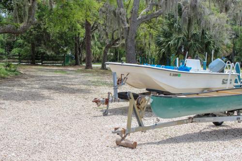 a small boat on a trailer on the gravel at Steinhatchee River Inn and Marina in Steinhatchee