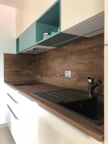 Η κουζίνα ή μικρή κουζίνα στο Apartmani Izvor - Tuheljske Toplice