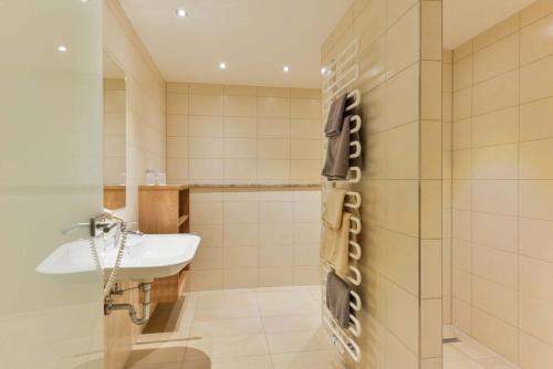 Koupelna v ubytování Hotel Sixt