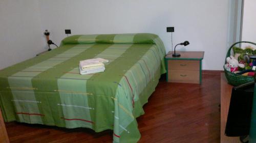 Ліжко або ліжка в номері Appartamento RELAX
