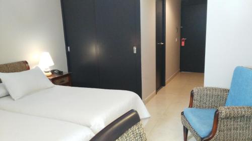 Cama ou camas em um quarto em La Albarizuela