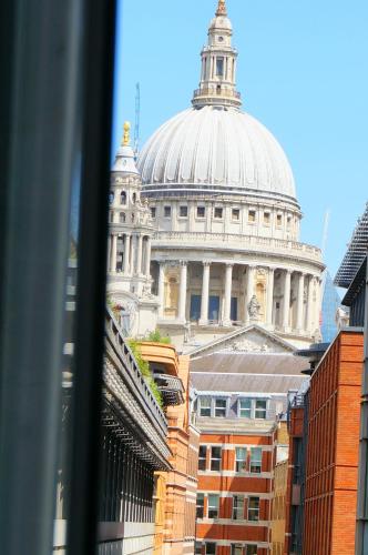 a view of a domed building with a cathedral at St Paul's by Excel Apartments in London