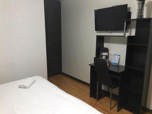 TV a/nebo společenská místnost v ubytování Stay Blue Hotel