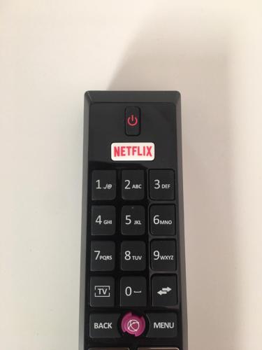a black calculator sitting on top of a table at Madison Rooms in Sitges