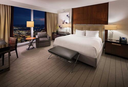 a large hotel room with a bed and a desk at Ocean Casino Resort in Atlantic City