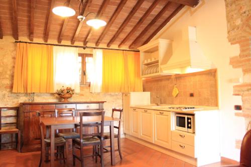 Kuchyň nebo kuchyňský kout v ubytování IL COLOMBAIO WINERY & Rooms