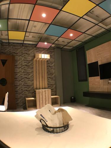 Una televisión o centro de entretenimiento en Chi Chu B&B