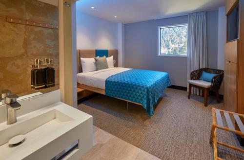 Säng eller sängar i ett rum på mi-pad Queenstown