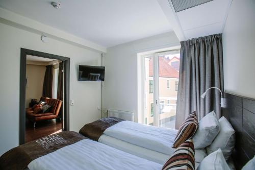 Postel nebo postele na pokoji v ubytování Best Western Plus Hotell Nordic Lund