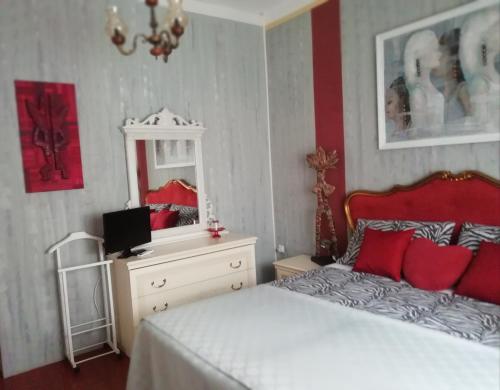 A bed or beds in a room at B&B Art