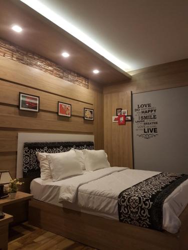 Postel nebo postele na pokoji v ubytování Lawaka Hotel