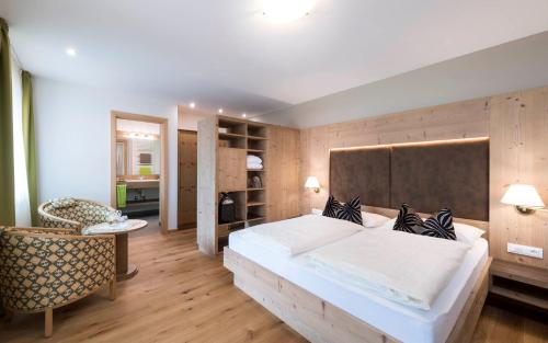 Postel nebo postele na pokoji v ubytování Hotel Oberbrunn