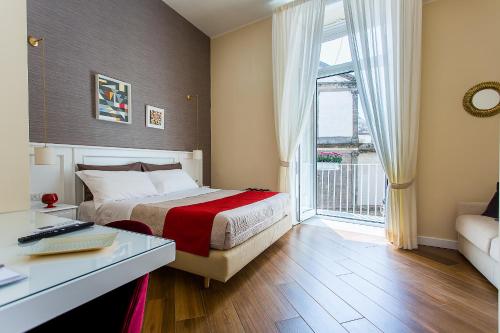 A bed or beds in a room at NovaNova