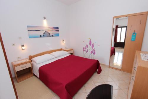 Postel nebo postele na pokoji v ubytování Room and Apartment Lea